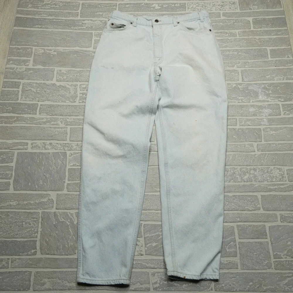 VINTAGE Levis Jeans Size 37x33 Light Wash Slight Taper USA Made Orange Tab